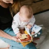 Babyono miekka ksiązeczka sensoryczna rozwojowa edukacyjna z zawieszką